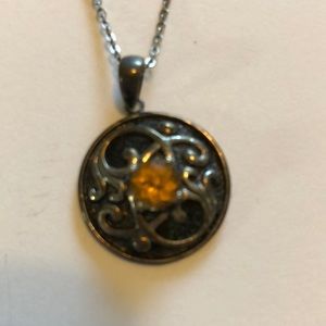 Antique finish pendant with deep yellow stone